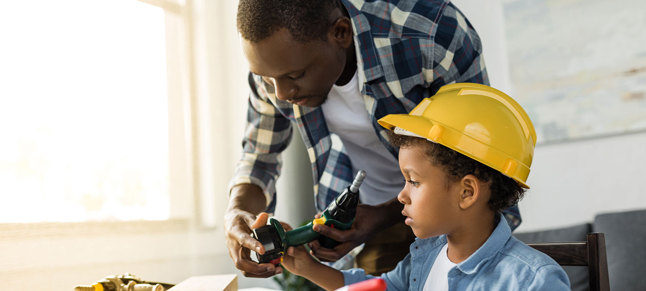 Father and son planning home renovation