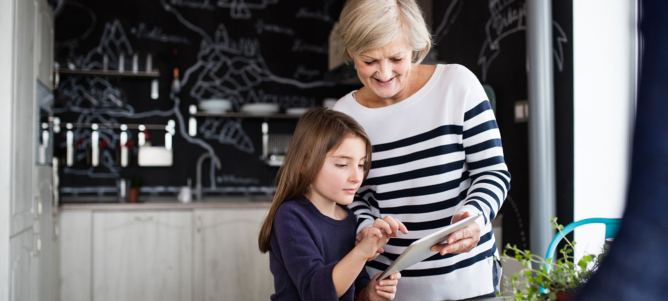 Grandmother and daughter in kitchen