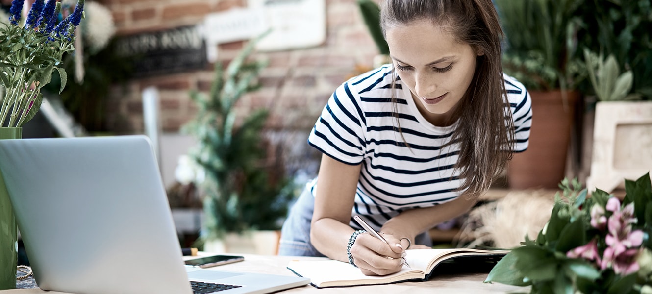 Female business owner doing paperwork